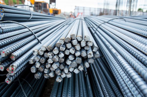 Construction steel rods or bars work reinforcement in concrete structure of building.Background texture of steel rods or bars used in construction to reinforce concrete